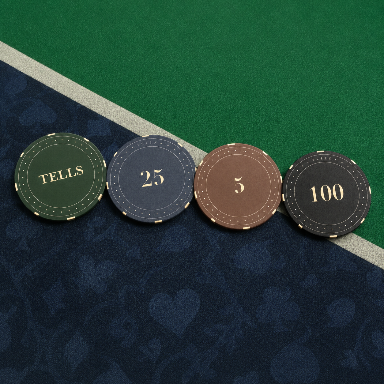 Lineup of custom ceramic poker chips with Tells Poker Club artwork